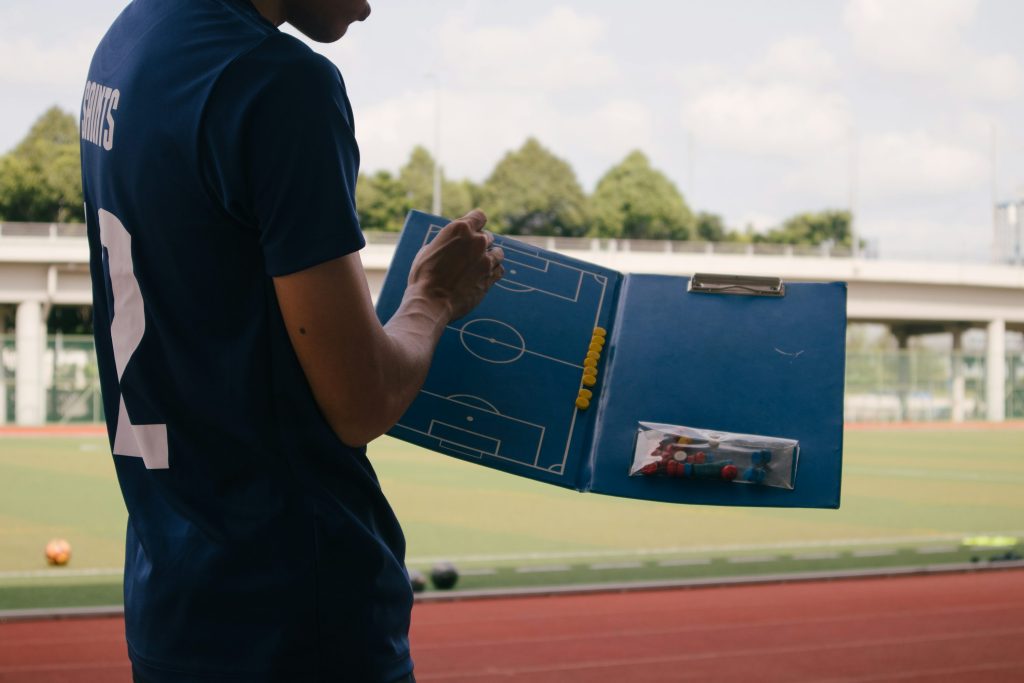 A trainer organizes its club with a sports club management system