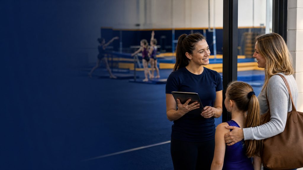 Coach and club administrator managing gymnastics club waitlist management at a youth sports session